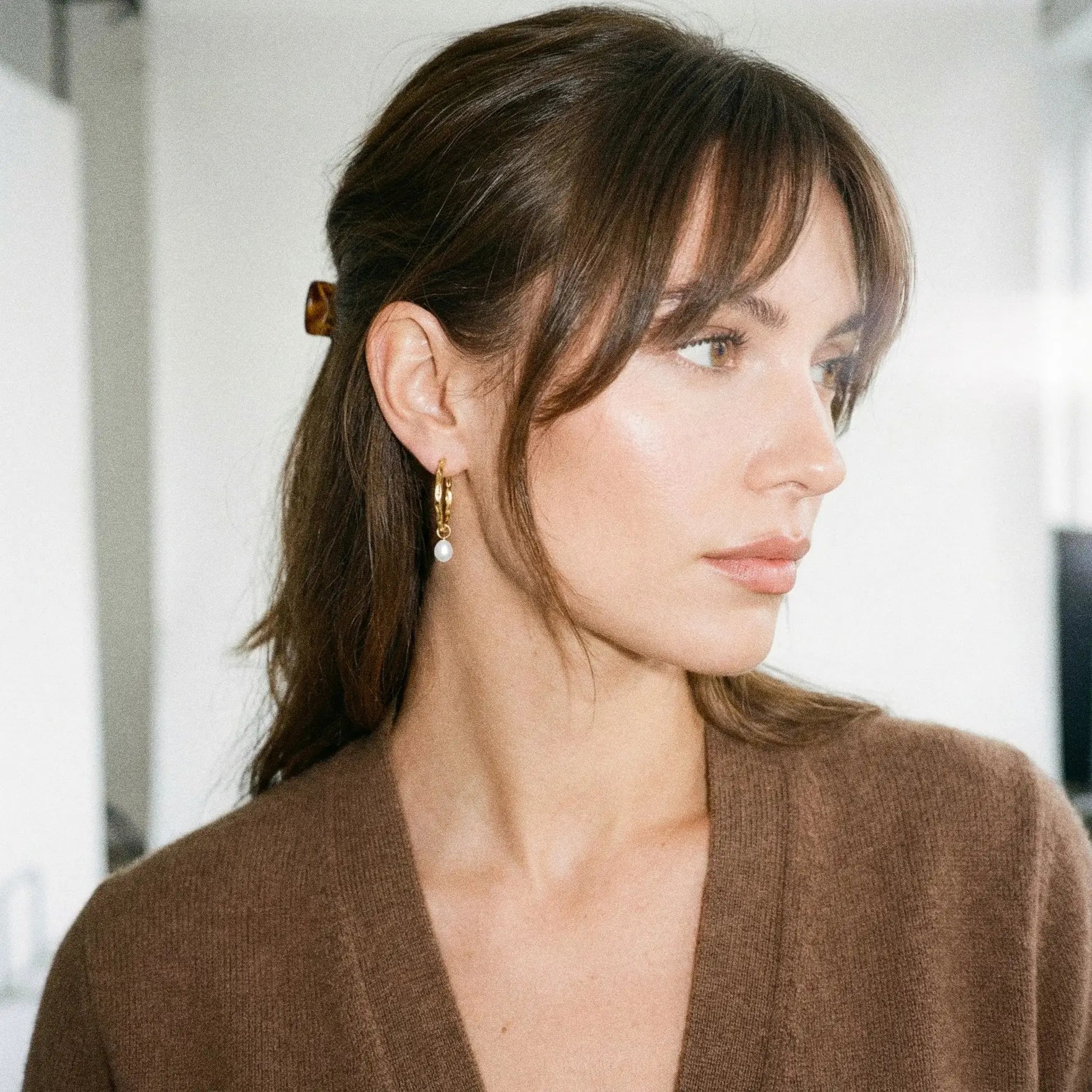 Effortless Elegance: Polished Earring Stacks with Studs, Huggies, and ...