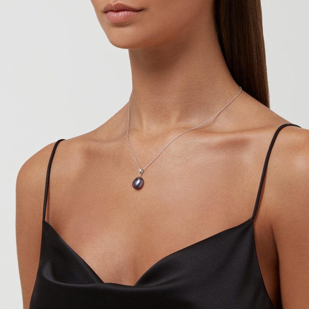 Paloma Picasso® Olive Leaf pendant in sterling silver with a cultured pearl.  | Tiffany & Co.